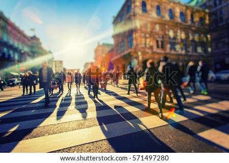 crowd of people walking on sunny streets 商業照片 © 