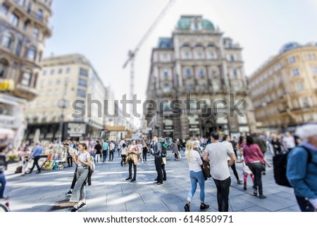 Similar – Image, Stock Photo Crowd of anonymous people walking in metro tunnel at a trade show