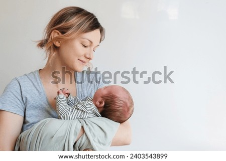 Similar – Image, Stock Photo Mom breastfeeding at home