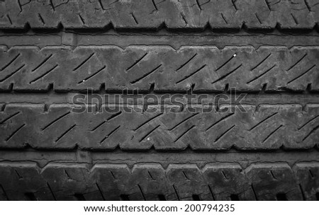 old pile of a worn out car tires pattern background