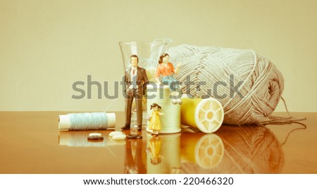 miniature family business with sewing kit set concept business fashion with retro filter