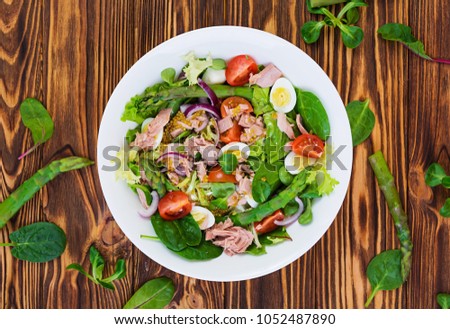 Similar – Image, Stock Photo Asparagus Salad with quails eggs and cheese crisps