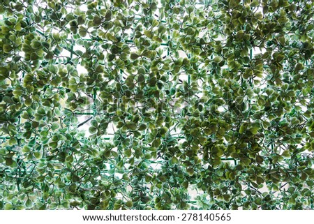 fake plant on wire fence for abstract background