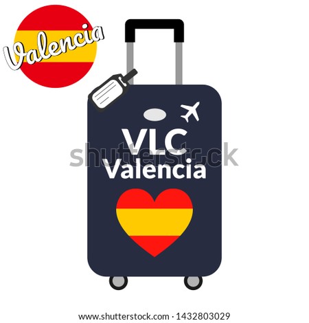 Luggage with airport station code IATA or location identifier and destination city name Valencia, VLC. Travel to Spain, Europe concept. Heart shaped flag of the Spain on baggage. 