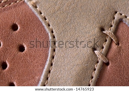 multiwall leather with decorative sutures
