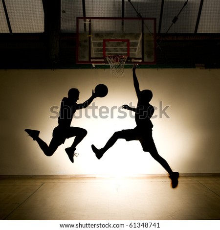 Basketball jump - black silhouettes