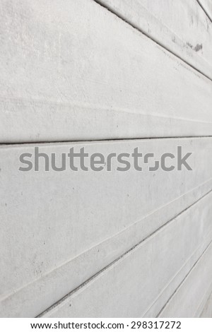 Gray concrete wall panels\Concrete slab close-up good for patterns and backgrounds.