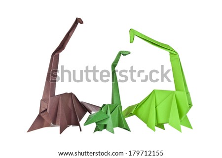 Origami. Paper figures of dinosaurs. Traditional Japanese art folding of figures from paper