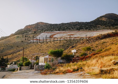 huge Turkish flag laid out on the hillside with colorful stones in Northern Cyprus Stok fotoğraf © 