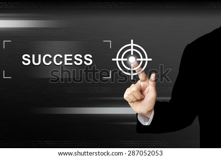 business hand clicking success button on a touch screen interface