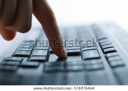 Close-up of typing male hands on keyboard