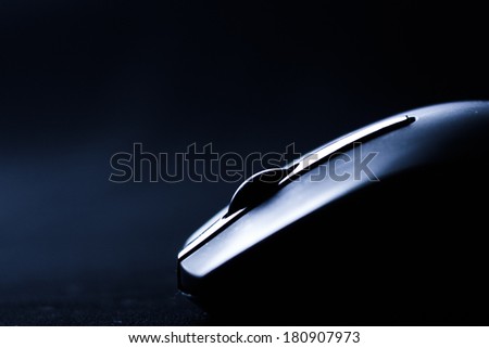 The mouse with a wheel on a black background