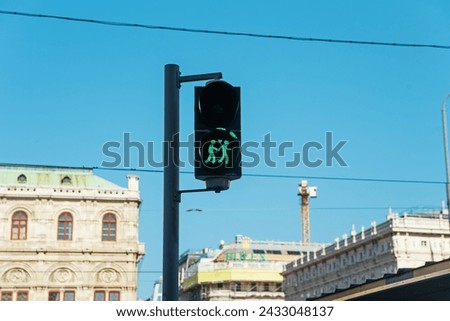 Similar – Image, Stock Photo LGBT pedestrian traffic light signals symbolizing equality