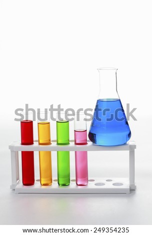 test tubes in a test on white background for symbolic photo for learning and researching.