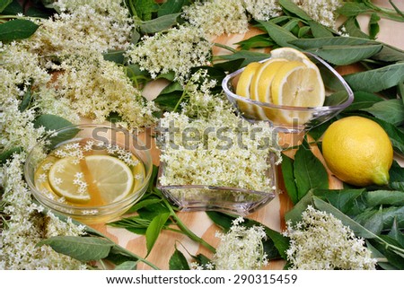 Health syrup  from elderberry flowers  on a wooden table