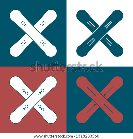 set of crossed snowboards with different schemes of binding mounting systems