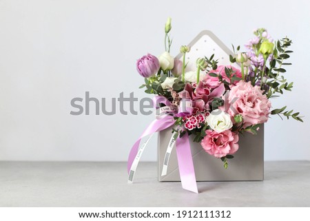 Similar – Image, Stock Photo Beautiful eustoma flowers bouquet on orange