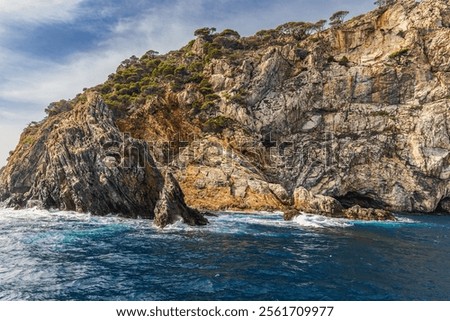 Similar – Image, Stock Photo Rocky hillside near ocean under cloudy sky