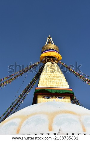 Bouddhanath stupa at Katmandu nepal under blue sky.big white stupa,golden umbrella and pinnacle with prayer flags Stock fotó © 