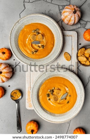 Similar – Image, Stock Photo Tasty pumpkin soup in bowl on table