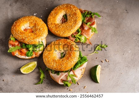 Similar – Image, Stock Photo Vegetable bagel sandwich on wooden table