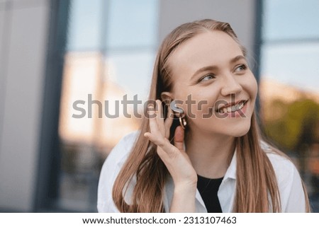 Similar – Image, Stock Photo Woman with earbuds in studio