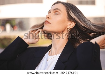 Similar – Image, Stock Photo Woman fixing hair near mirror in restroom
