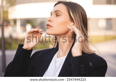Similar – Image, Stock Photo Woman fixing hair near mirror in restroom