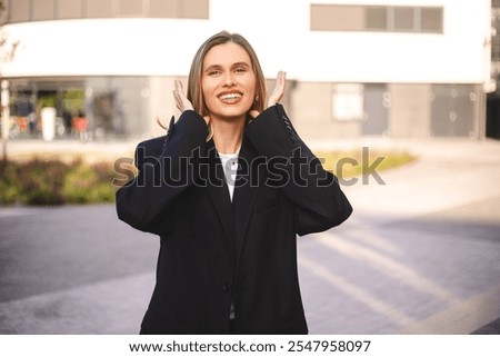 Image, Stock Photo Woman fixing hair near mirror in restroom