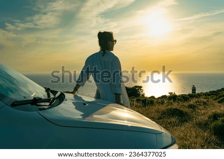 Similar – Image, Stock Photo Woman enjoying sunset in desert valley