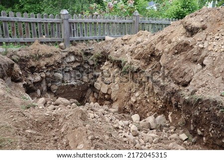 Similar – Image, Stock Photo Large holes in the plaster on a brick wall, from which a small green plant grows