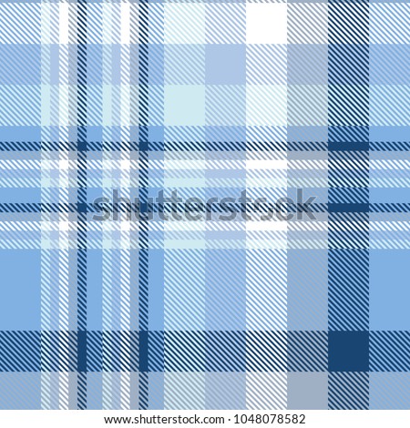 Seamless plaid check pattern in shades of blue, navy and white. Checkered fabric texture for digital textile printing.  