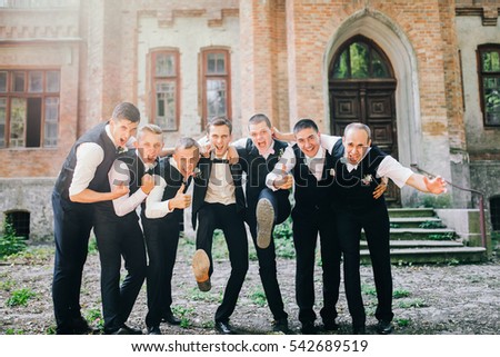 Similar – Image, Stock Photo Groom and best man putting on the suit