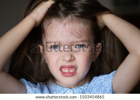 Similar – Image, Stock Photo Sad girl portrait clinging to a gate