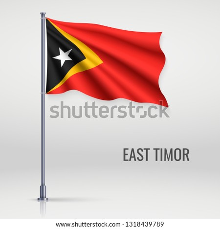 Waving flag of East Timor on flagpole. Template for independence day poster design