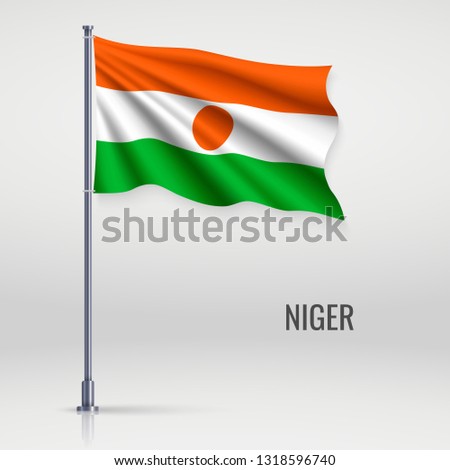 Waving flag of Niger on flagpole. Template for independence day poster design