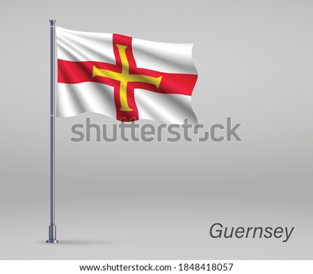 Waving flag of Guernsey - territory of United Kingdom on flagpole. Template for independence day