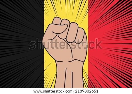 Human fist clenched symbol on flag of Belgium background. Power and strength logo