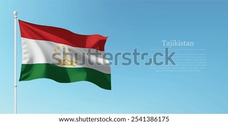 Waving flag of Tajikistan on a pole with a blue sky backdrop with copyspace