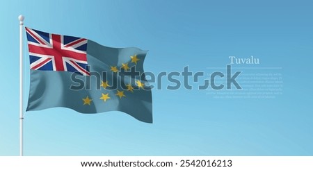 Waving flag of Tuvalu on a pole with a blue sky backdrop with copyspace