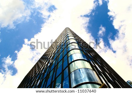 The abstract of steel and glass building reaching the sky (overexposed purposely)