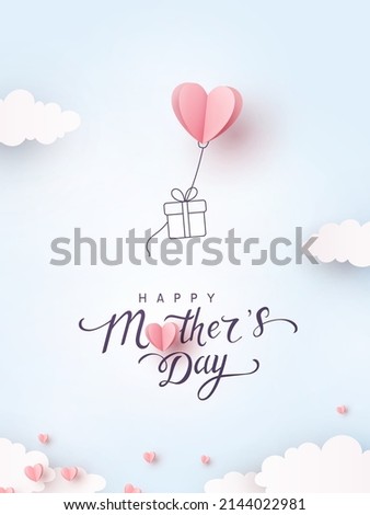 Mother's day postcard with paper flying elements and gift box on blue sky background. Vector symbols of love in shape of heart for greeting card design Stock fotó © 