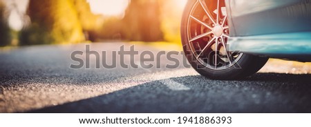 Similar – Image, Stock Photo Closeup of car tires in winter on the dirt road covered with ice, snow and gravel