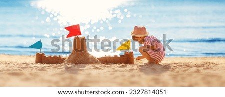 Similar – Image, Stock Photo Toddler playing with sea shells