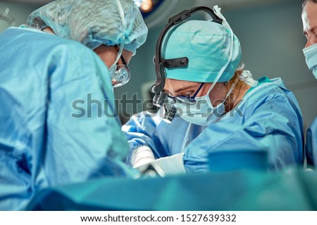 Similar – Image, Stock Photo Female surgeon in operating theater