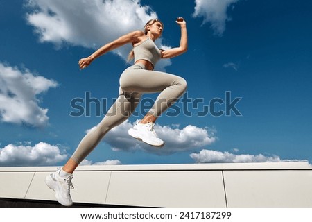 Similar – Image, Stock Photo Legs of a woman in a white culotte with colorful geometric shapes on a cobbled pavement. Casting shadows. Walking, pedestrian