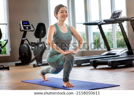 Similar – Image, Stock Photo Smiling overweight ethnic sportswoman against fence and sea