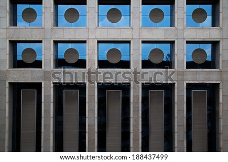 Circle, rectangle of window style in concrete building pattern