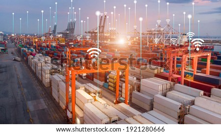 Smart crane loading cargo with smart line and smart wifi in the international terminal logistic depot sea port  concept freight shipping transportation and service concept.