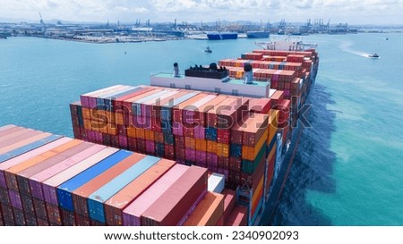 Stern of large cargo container ship import export container box on the ocean sea on blue sky back ground concept transportation logistic and service to customer and supply change.	 Foto stock © 